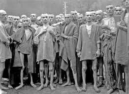 Image of starved prisoners in a concentration camp